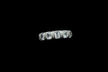 Load image into Gallery viewer, Sterling Silver Emerald Cut Cubic Zirconia Eternity Band
